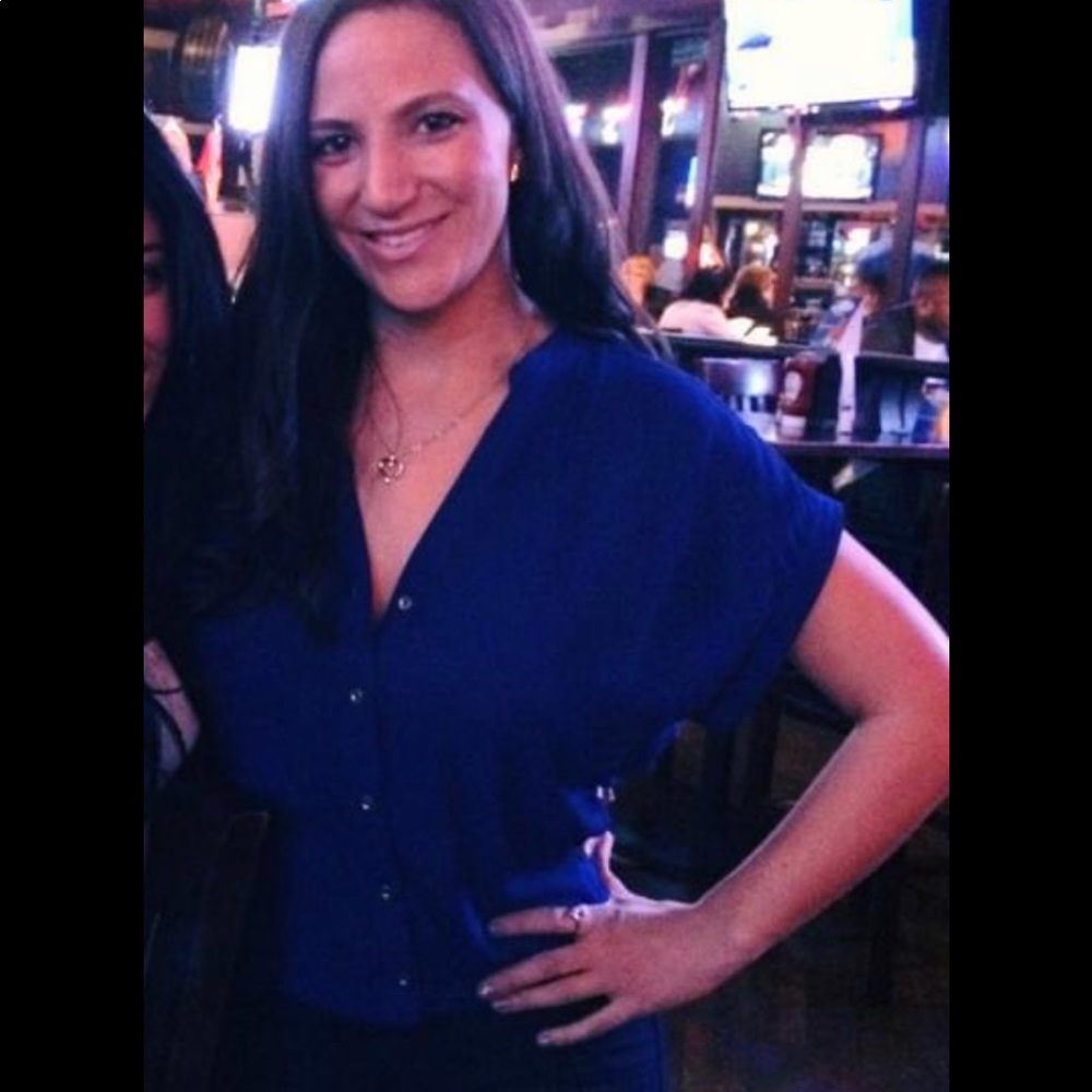 Blue blouse, gold buttons